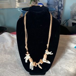Multi string wooden and ivory necklace